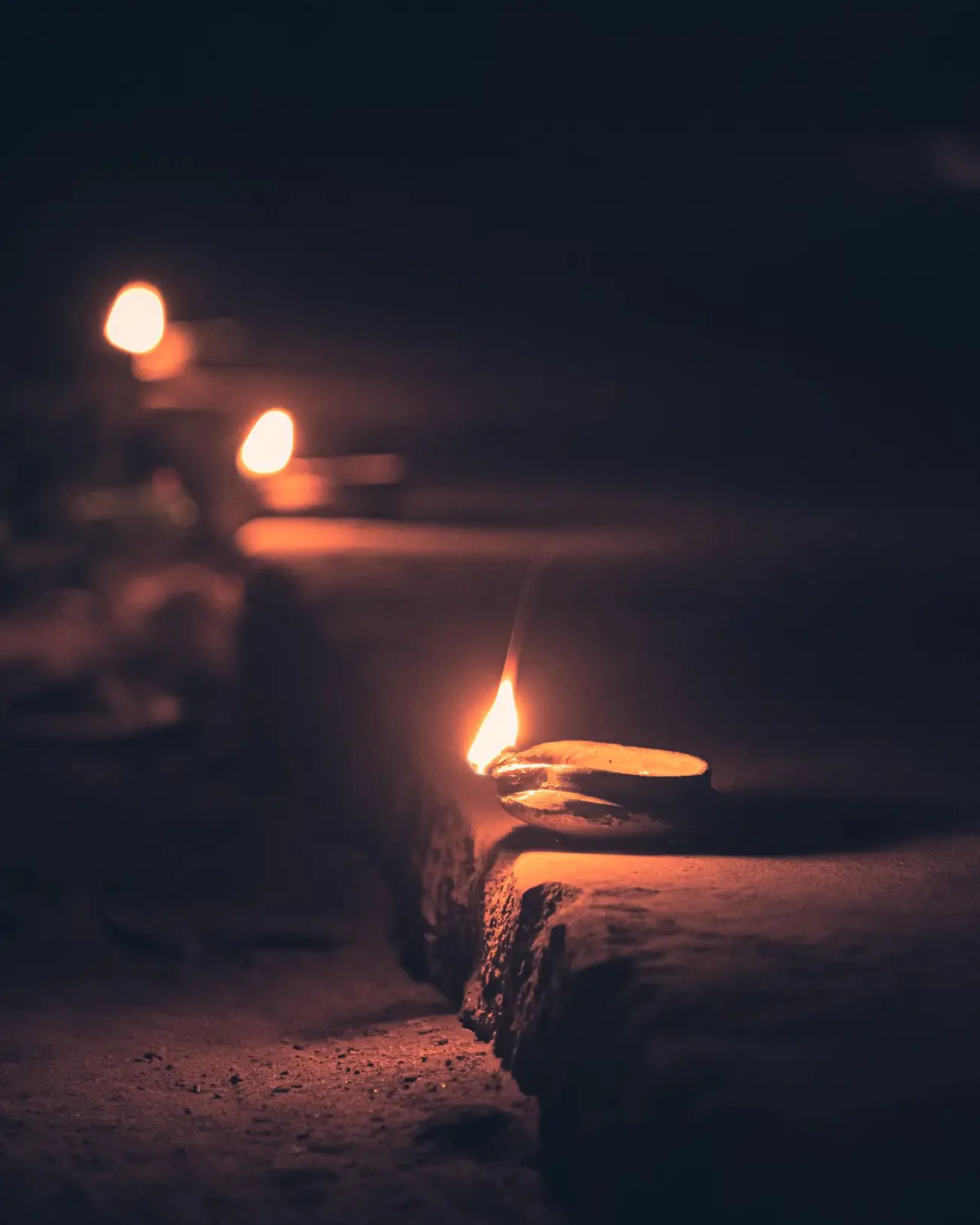 Rows of oil lamps lit for the evening reception